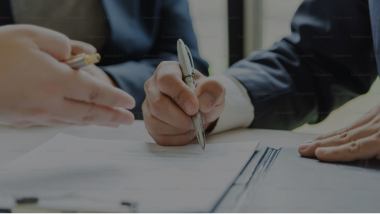 people signing a document