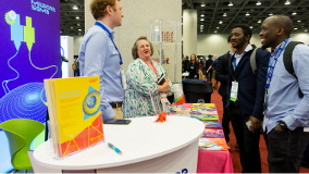 people conversing in a conference